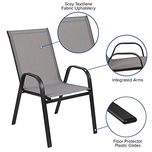 Flash Furniture Brazos 7 Piece Outdoor Patio Dining Set - 6 Gray Flex Comfort Stack Chairs - 55" Tempered Glass Patio Table with Umbrella Hole