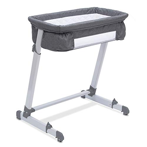 Delta Children Adjustable Bassinet Crib with Wheels
