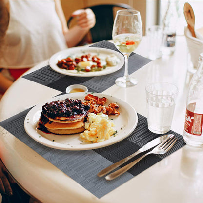 GIVERARE Placemats Set of 4, Heat-Resistant Woven Vinyl Placemat, Non-Slip Washable PVC Table Mat, Easy to Clean Premium Plastic Table Mats for Dining Table, Kitchen Table (Black+Gray)