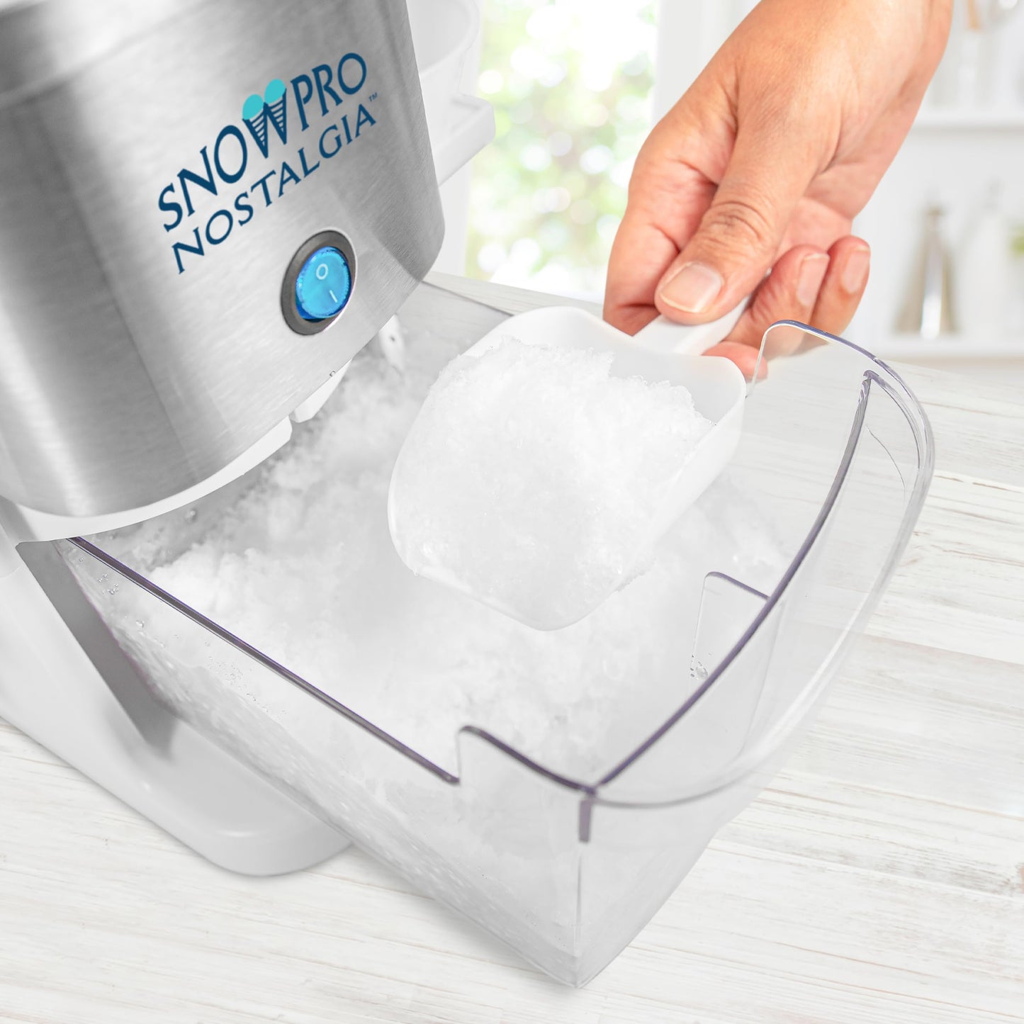 Nostalgia SnowPro Electric Shaved Ice & Snow Cone Maker 64-Ounce Ice Shaving Capacity, 4 Reusable Cones, Side Shelves, and Scoop Included