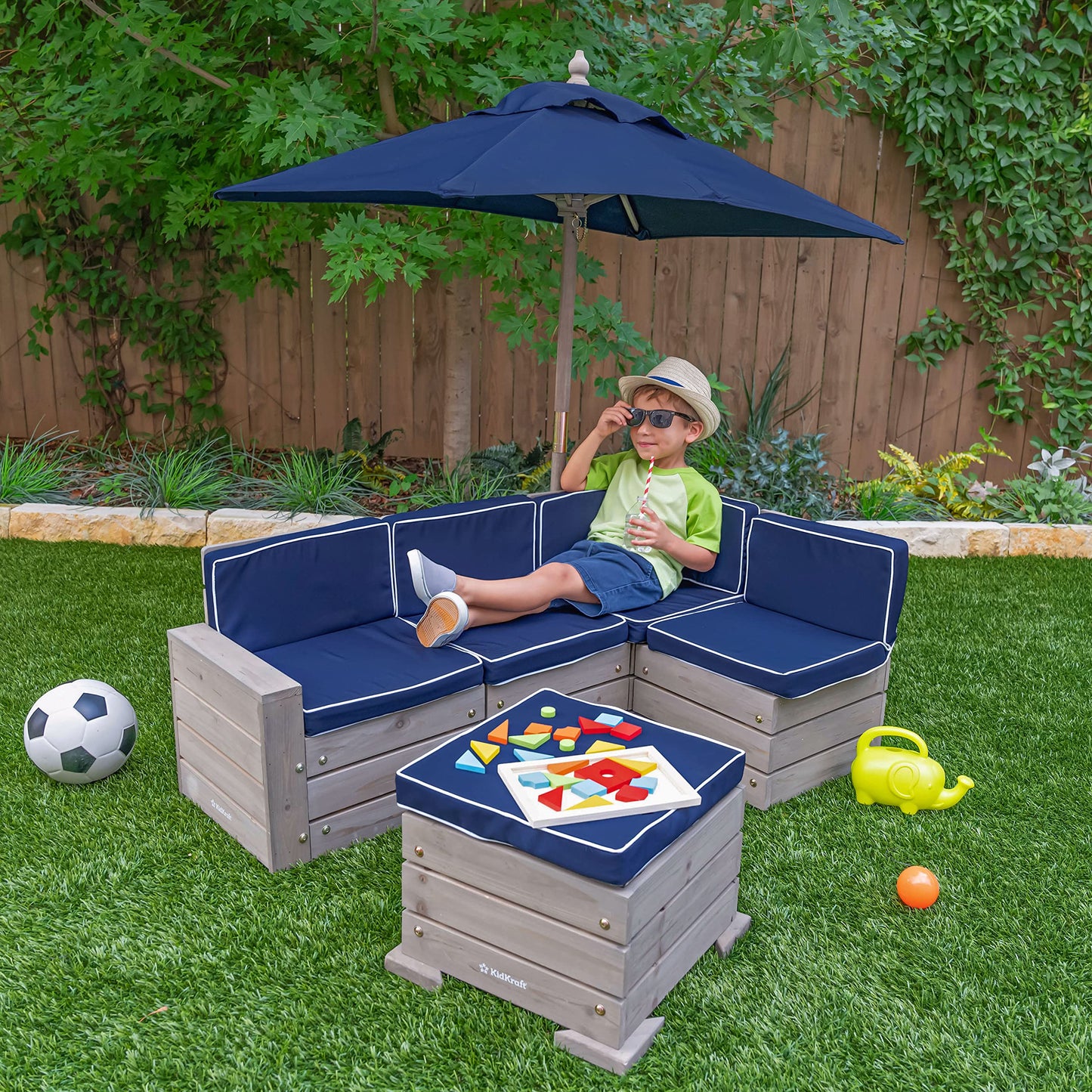 KidKraft Wooden Outdoor Sectional Ottoman & Umbrella Set with Cushions, Patio Furniture for Kids or Pets, Barnwood Gray & Navy