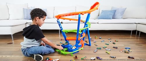 Hot Wheels Toy Car Track Set Spiral Speed Crash, Powered by Motorized Booster, 29-in Tall Track with 1:64 Scale Car