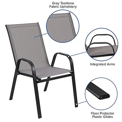 Flash Furniture Brazos 7 Piece Outdoor Patio Dining Set - 6 Gray Flex Comfort Stack Chairs - 55" Tempered Glass Patio Table with Umbrella Hole