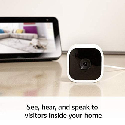 Blink Mini – Compact indoor plug-in smart security camera, 1080p HD video, night vision, motion detection, two-way audio, easy set up, Works with Alexa – 4 cameras (White)