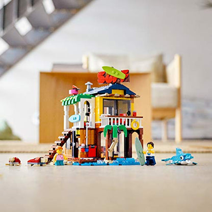LEGO Creator 3 in 1 Surfer Beach House with 2 Minifigures and Dolphin Figure, Transforms from Surf Shack to Lighthouse to Pool House, Great Building Toy Set for Kids, Girls, and Boys Ages 8+, 31118