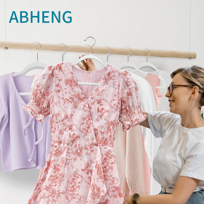 ABHENG 20 Pack Clothes Hangers, Non Slip Plastic Coat Hangers, 360°Swivel Hook, Space Saving, 0.2 Inches Thick, Heavy Duty, Hanging Dry Wet Clothes, White + Silver, UAPY0120W