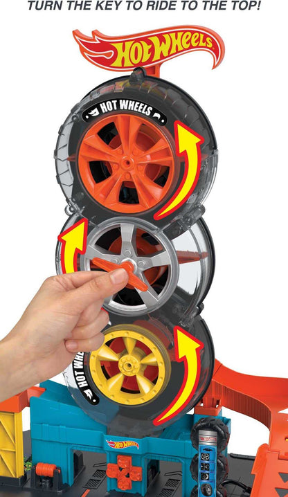Hot Wheels City Super Twist Tire Shop Playset, Spin the Key to Make Cars Travel Through the Tires, Includes 1 Hot Wheels Car, for Kids 4 to 8 Years Old (Amazon Exclusive)