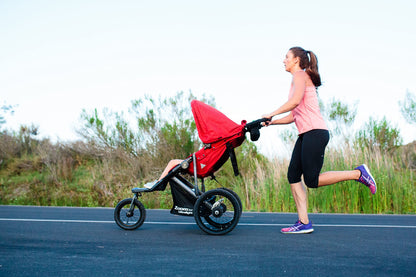 Joovy Zoom360 Ultralight Jogging Stroller Featuring High Child Seat, Shock-Absorbing Suspension, Extra-Large Air-Filled Tires, Parent Organizer, Air Pump, and Easy One-Hand Fold (Red)